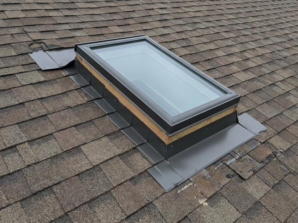 Skylight curb and flashing
