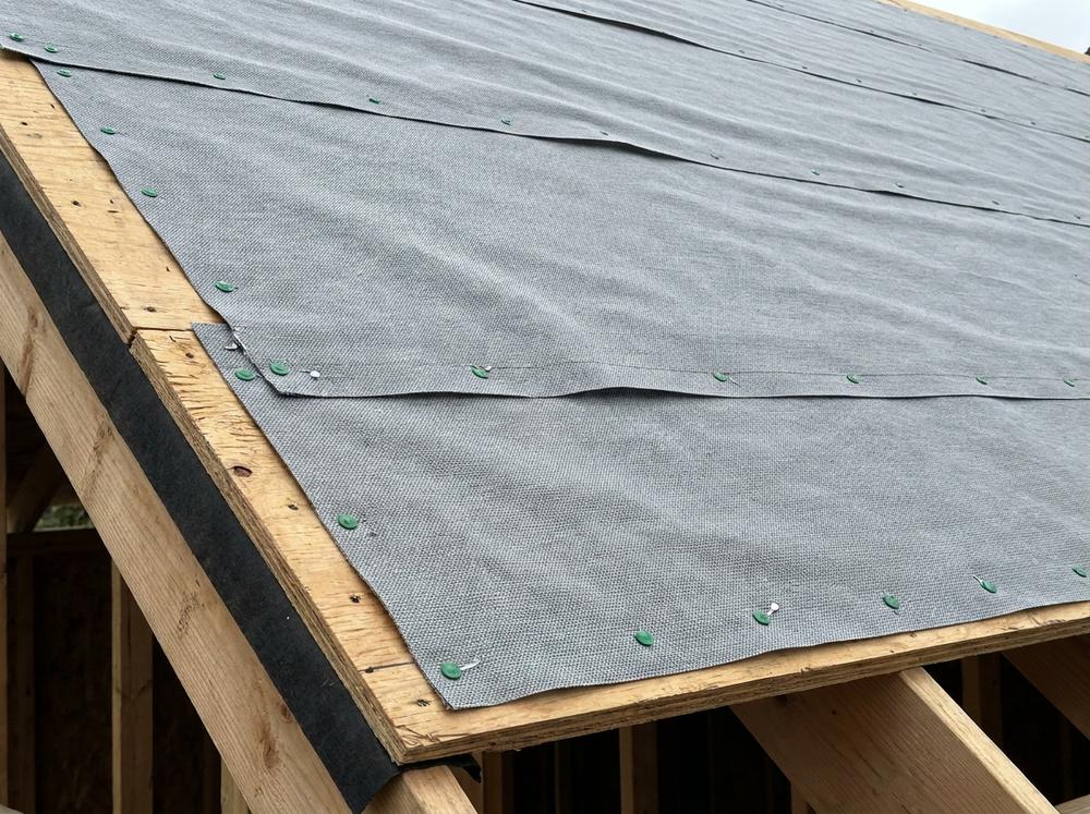 Synthetic underlayment on the deck