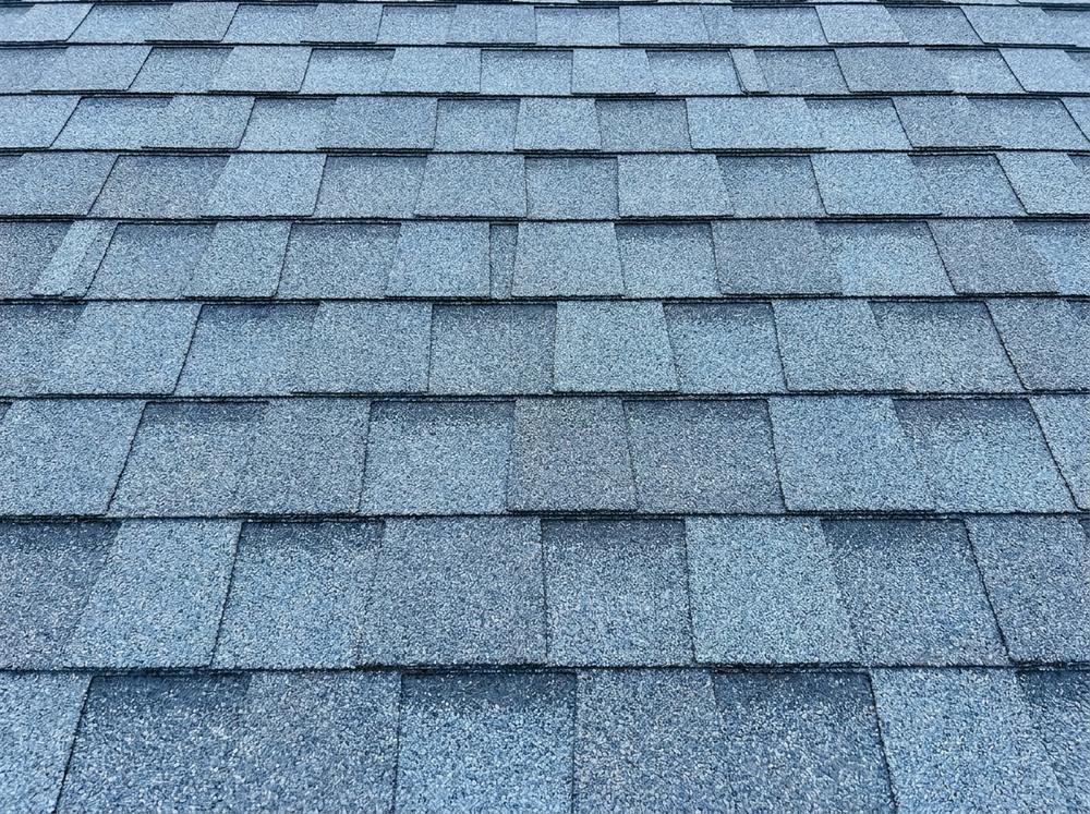 Close-up of a blue-grey Class 4 impact-resistant laminated asphalt shingle roof