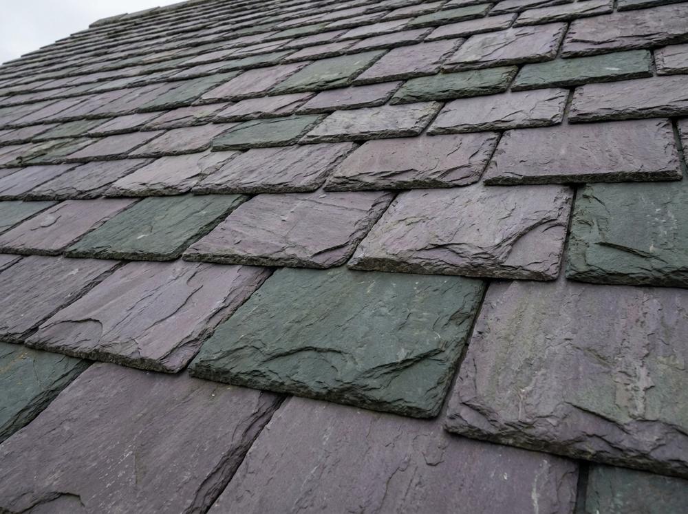 Natural slate roof in mixed purple-grey and green tones